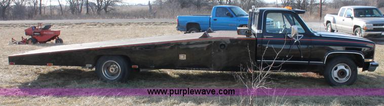 image for item E2552 1983 Chevrolet Silverado 30 car hauler truck