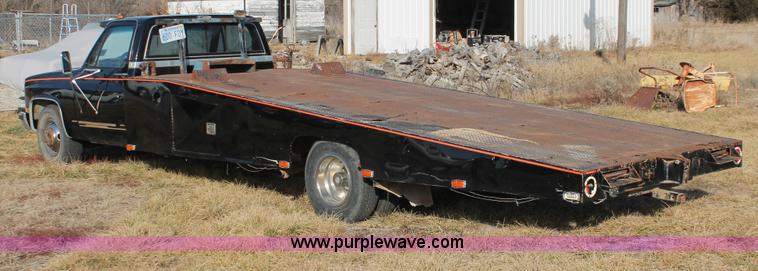 image for item E2552 1983 Chevrolet Silverado 30 car hauler truck