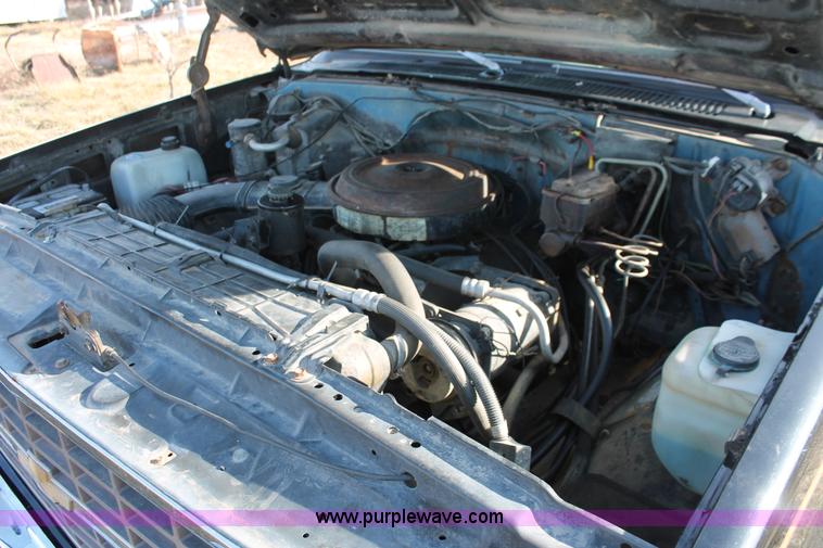 image for item E2552 1983 Chevrolet Silverado 30 car hauler truck