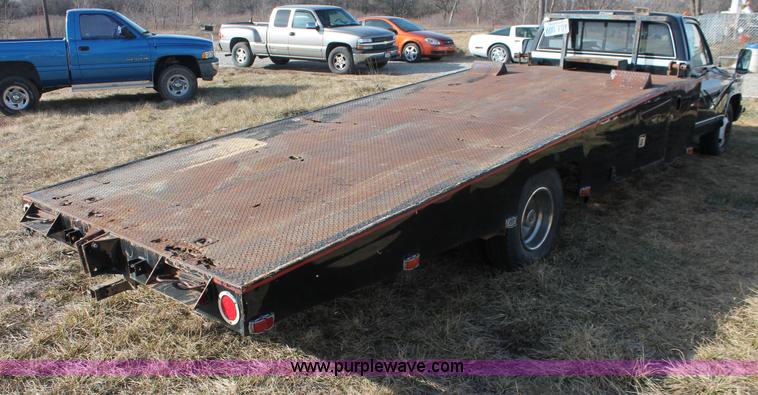 image for item E2552 1983 Chevrolet Silverado 30 car hauler truck