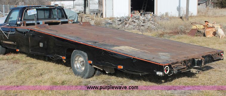 image for item E2552 1983 Chevrolet Silverado 30 car hauler truck