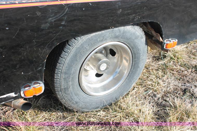 image for item E2552 1983 Chevrolet Silverado 30 car hauler truck