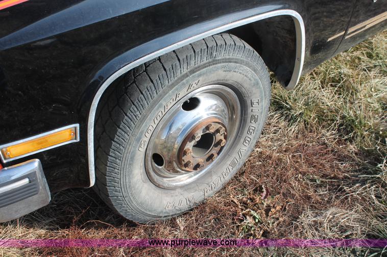 image for item E2552 1983 Chevrolet Silverado 30 car hauler truck