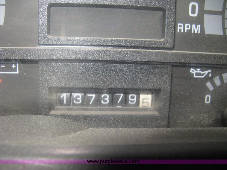 image for item E3001 1998 GMC C6500 dump/scissor lift body truck