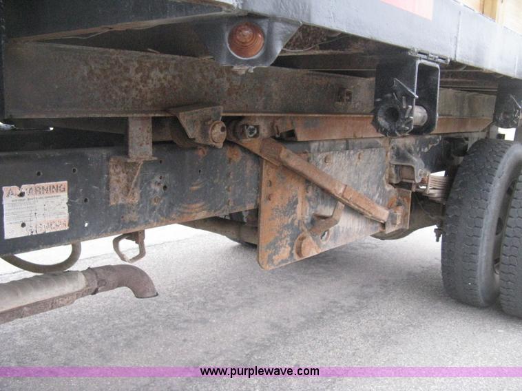 image for item E3001 1998 GMC C6500 dump/scissor lift body truck