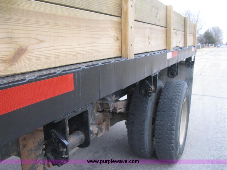 image for item E3001 1998 GMC C6500 dump/scissor lift body truck