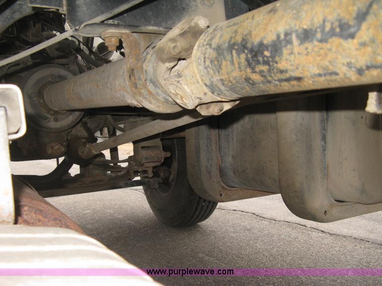 image for item E3001 1998 GMC C6500 dump/scissor lift body truck