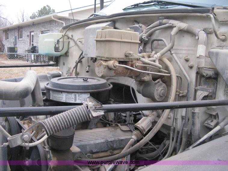 image for item E3001 1998 GMC C6500 dump/scissor lift body truck