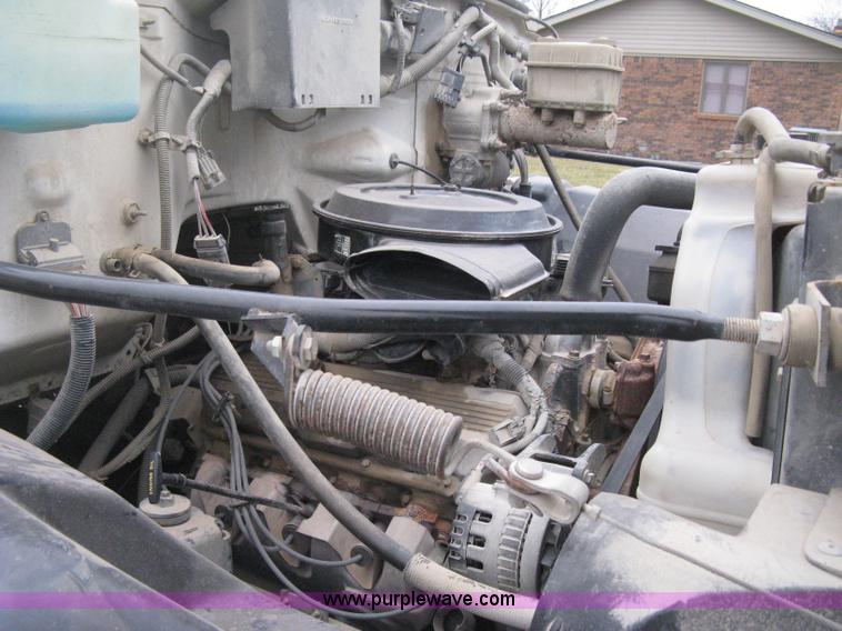 image for item E3001 1998 GMC C6500 dump/scissor lift body truck