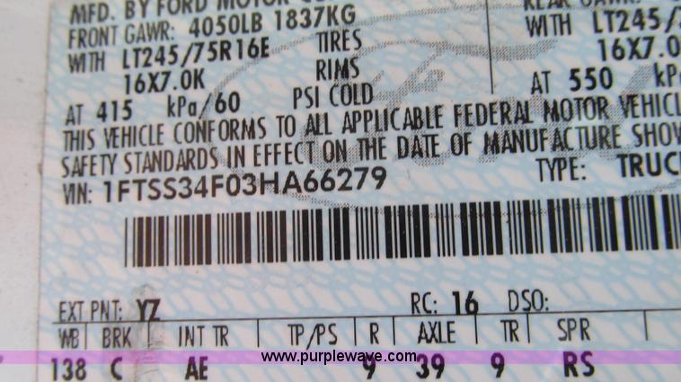 image for item E3676 2003 Ford E350 Super Duty cargo van