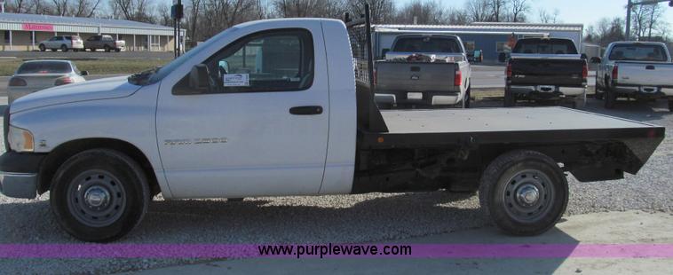 image for item E3680 2003 Dodge Ram 2500 flatbed truck