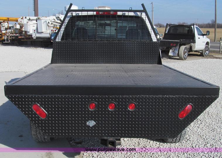 image for item E3680 2003 Dodge Ram 2500 flatbed truck