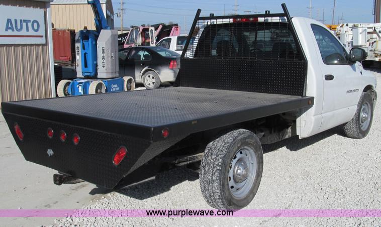 image for item E3680 2003 Dodge Ram 2500 flatbed truck