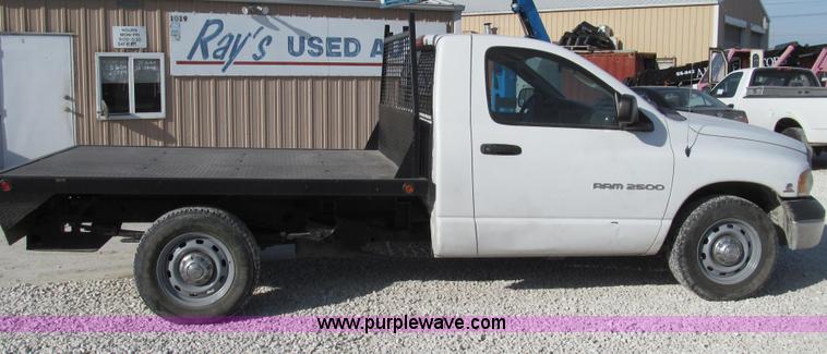 image for item E3680 2003 Dodge Ram 2500 flatbed truck