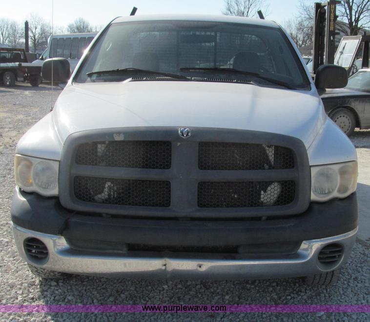image for item E3680 2003 Dodge Ram 2500 flatbed truck