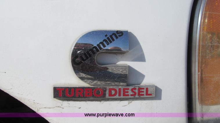 image for item E3680 2003 Dodge Ram 2500 flatbed truck