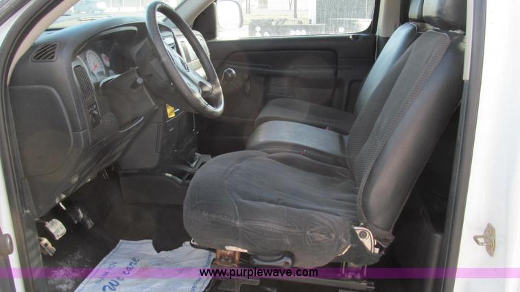 image for item E3680 2003 Dodge Ram 2500 flatbed truck