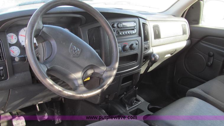 image for item E3680 2003 Dodge Ram 2500 flatbed truck