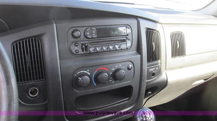 image for item E3680 2003 Dodge Ram 2500 flatbed truck