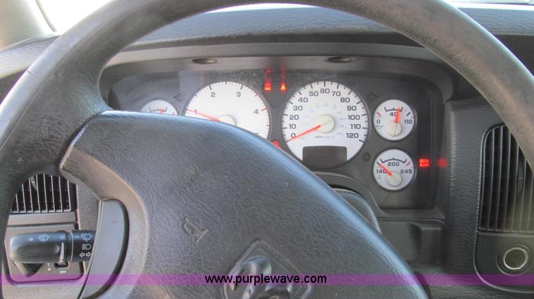 image for item E3680 2003 Dodge Ram 2500 flatbed truck