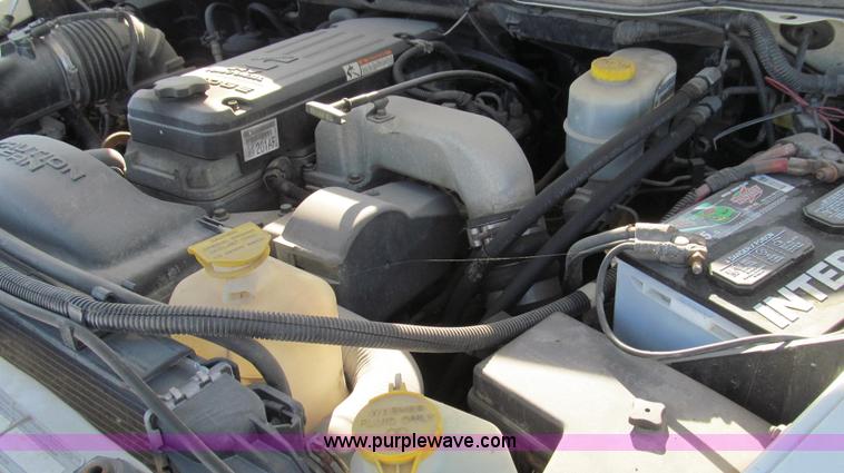 image for item E3680 2003 Dodge Ram 2500 flatbed truck