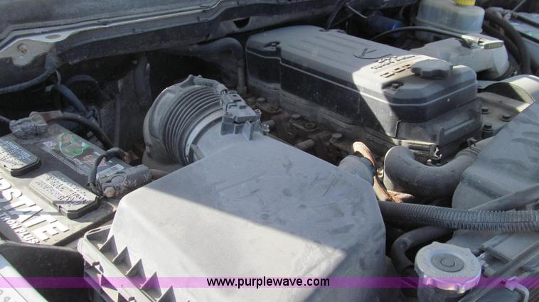 image for item E3680 2003 Dodge Ram 2500 flatbed truck