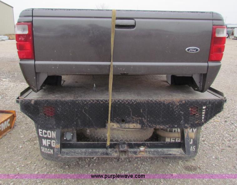 image for item E8291 2004 Ford Ranger XLT SuperCab flatbed pickup truck