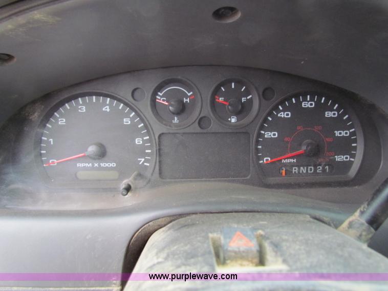 image for item E8291 2004 Ford Ranger XLT SuperCab flatbed pickup truck