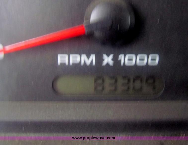 image for item E8291 2004 Ford Ranger XLT SuperCab flatbed pickup truck