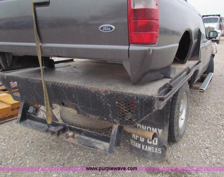image for item E8291 2004 Ford Ranger XLT SuperCab flatbed pickup truck