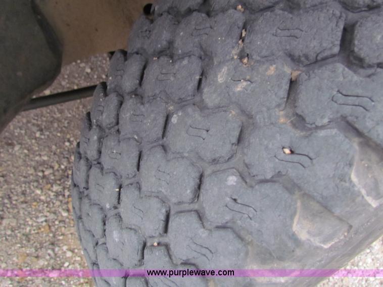 image for item E8291 2004 Ford Ranger XLT SuperCab flatbed pickup truck