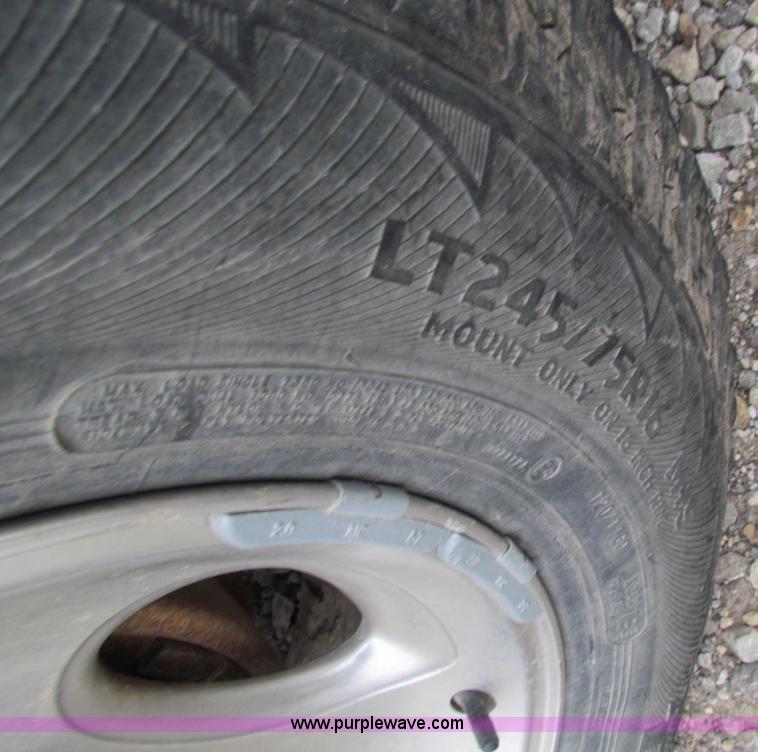 image for item E8291 2004 Ford Ranger XLT SuperCab flatbed pickup truck