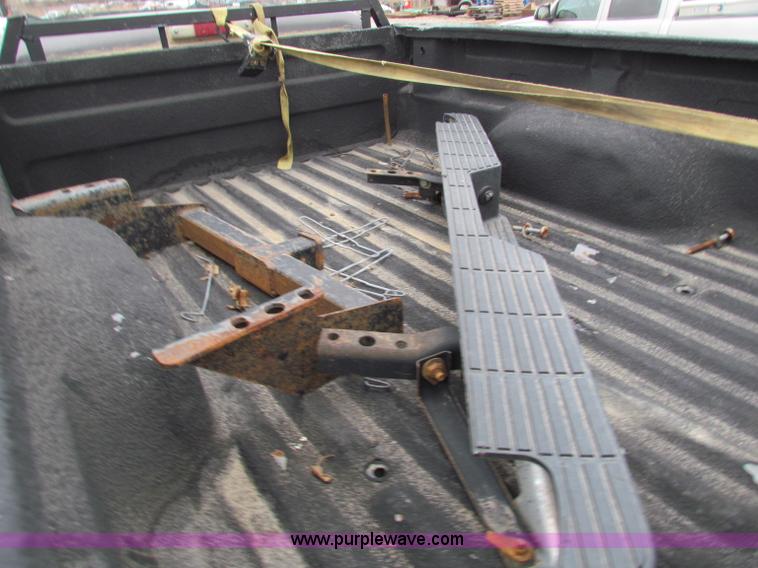 image for item E8291 2004 Ford Ranger XLT SuperCab flatbed pickup truck