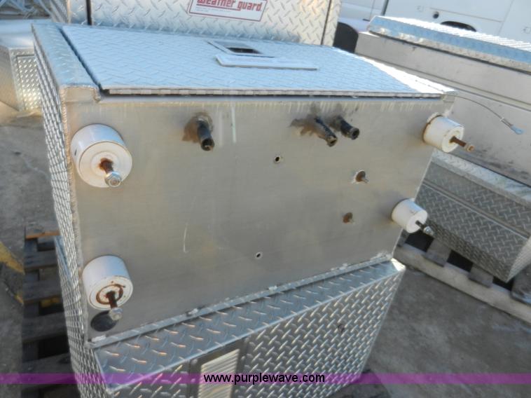 (2) Weatherguard storage containers in Topeka, KS Item W9530 sold