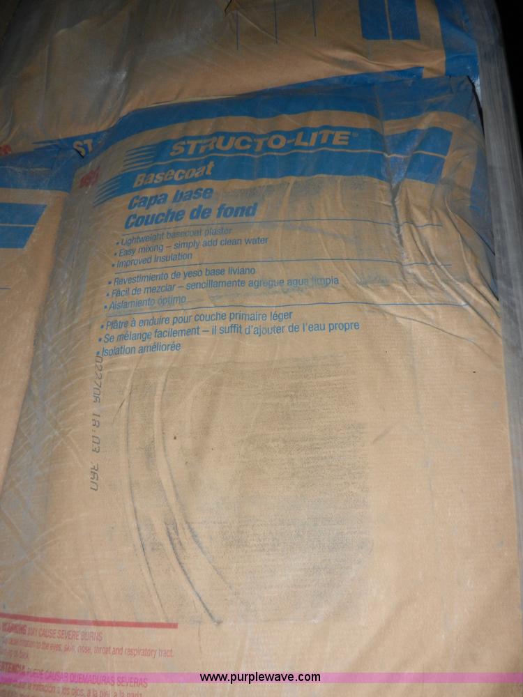 Approximately 115 50 lbs bags of structolite basecoat plaster in