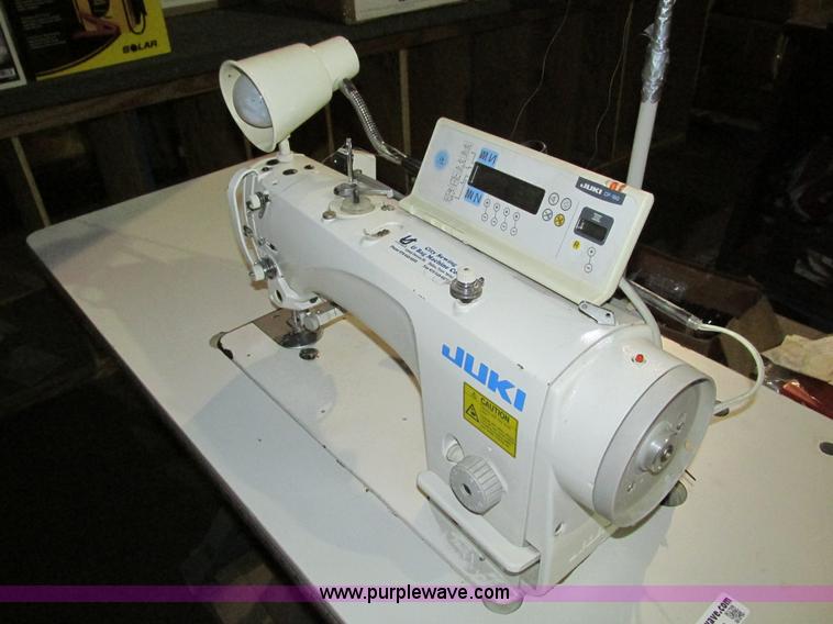 image for item Y9535 Juki sewing machine and table