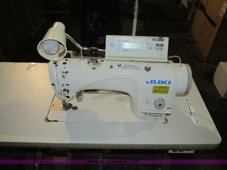 image for item Y9535 Juki sewing machine and table