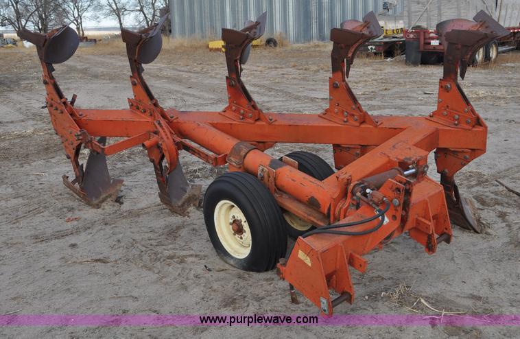 image for item C3391 Massey Fergusen 570 five bottom rollover plow
