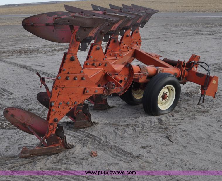 image for item C3391 Massey Fergusen 570 five bottom rollover plow