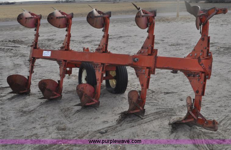 image for item C3391 Massey Fergusen 570 five bottom rollover plow