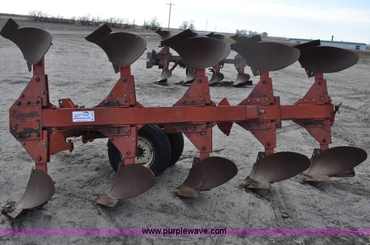 image for item C3391 Massey Fergusen 570 five bottom rollover plow