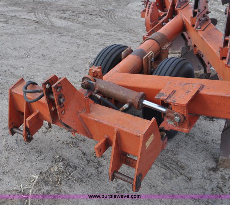 image for item C3391 Massey Fergusen 570 five bottom rollover plow