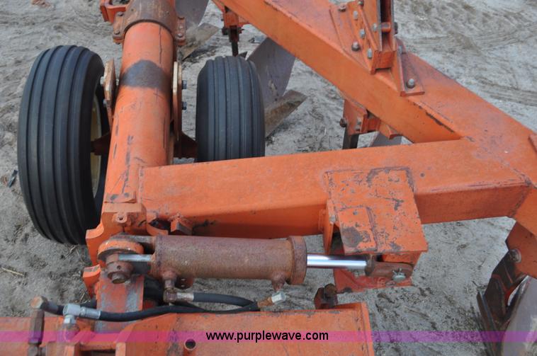 image for item C3391 Massey Fergusen 570 five bottom rollover plow