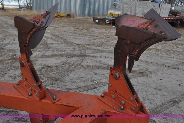 image for item C3391 Massey Fergusen 570 five bottom rollover plow