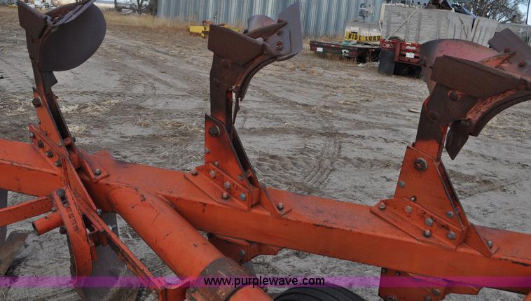 image for item C3391 Massey Fergusen 570 five bottom rollover plow