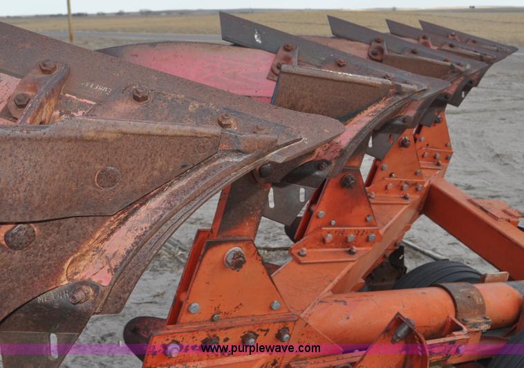 image for item C3391 Massey Fergusen 570 five bottom rollover plow