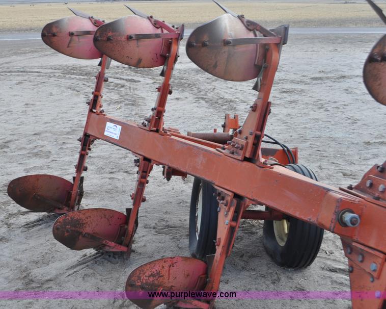 image for item C3391 Massey Fergusen 570 five bottom rollover plow