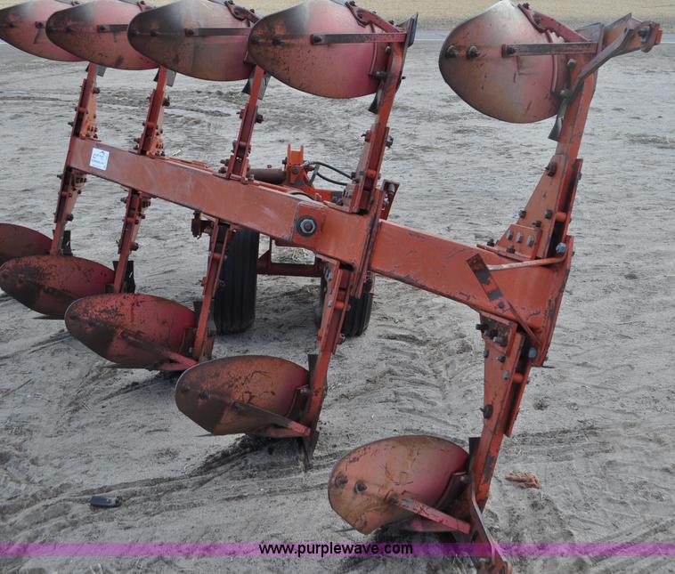 image for item C3391 Massey Fergusen 570 five bottom rollover plow