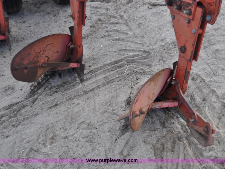 image for item C3391 Massey Fergusen 570 five bottom rollover plow