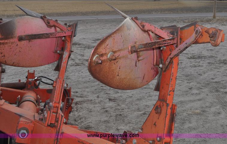 image for item C3391 Massey Fergusen 570 five bottom rollover plow